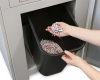 Shredded cards, dice and chips land in the rugged waste bin for easy disposal