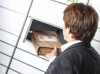 Door opens for package retrieval
